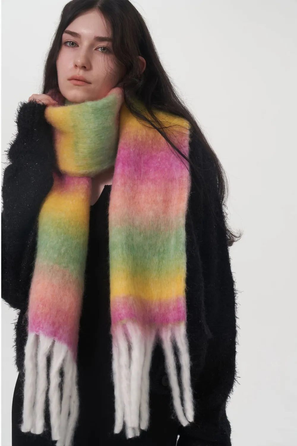 Rainbow gradient thermal scarf with soft fuzzy texture and long fringe ends.