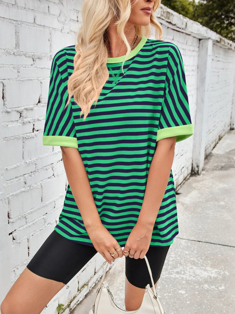 Green striped round-neck half-sleeve T-shirt with crew neckline and curved hem