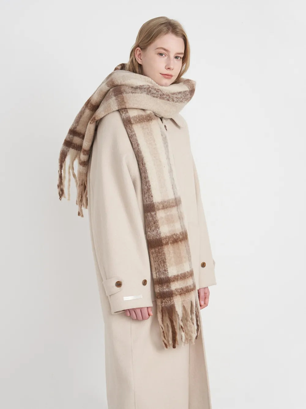 Plaid polyester scarf in brown and cream tones with long fringe ends