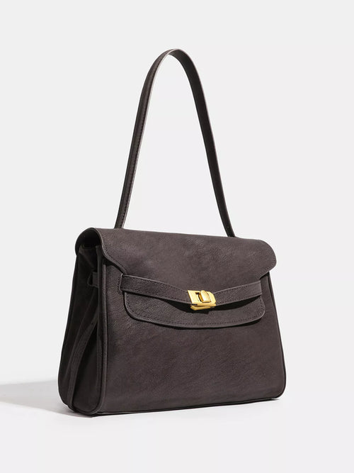 Coffee brown satchel shoulder bag with front flap, gold-tone buckle and side pocket
