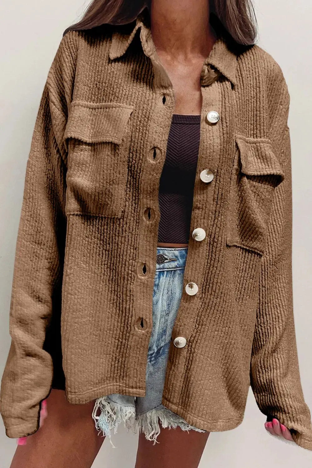 Camel button-up long sleeve shacket with point collar, flap chest pockets, and metal buttons