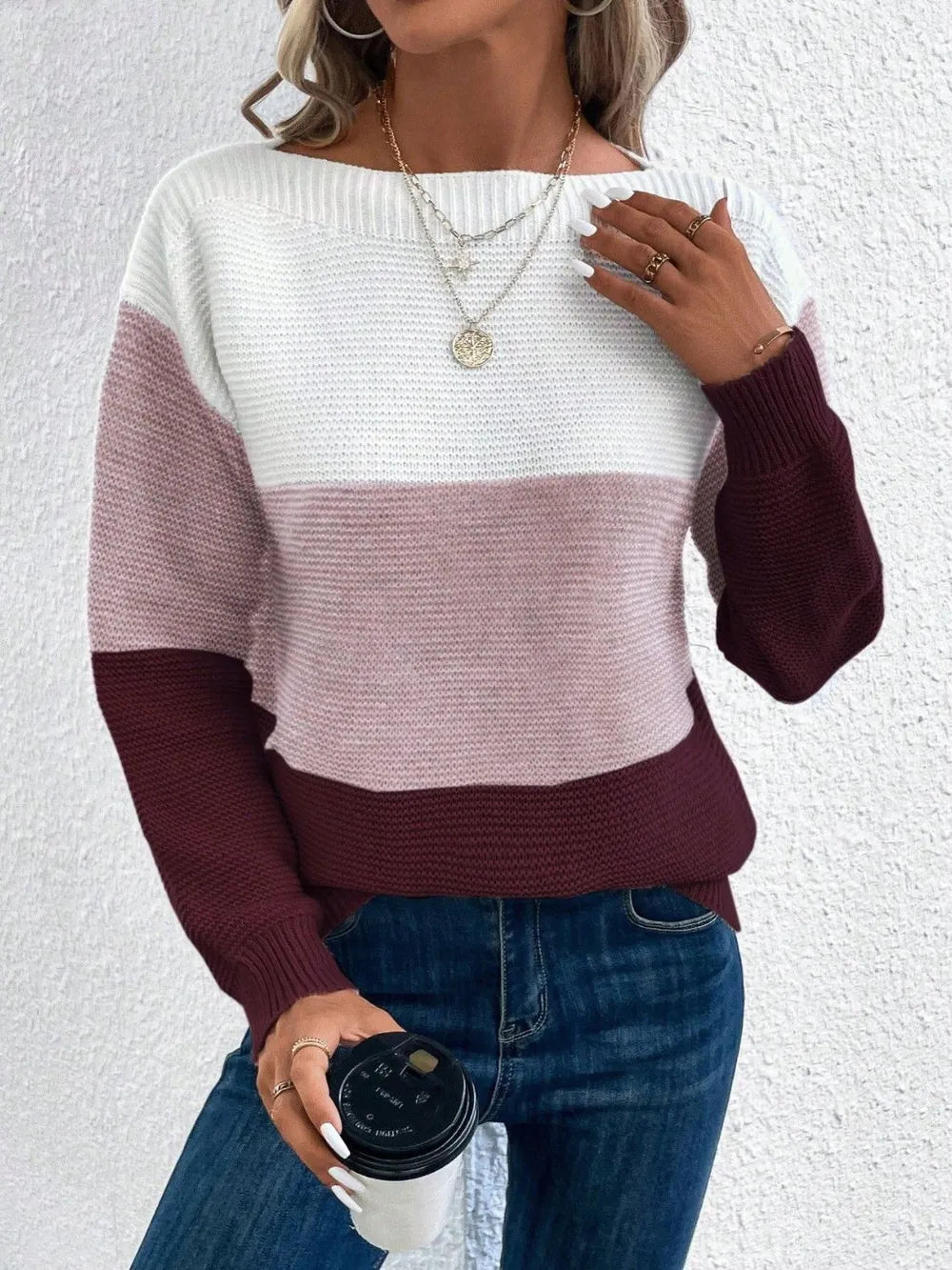 Color-block boat neck sweater in white, dusty pink, and burgundy, long sleeves.