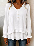 White V-neck long-sleeve blouse with front buttons and ruffled hem