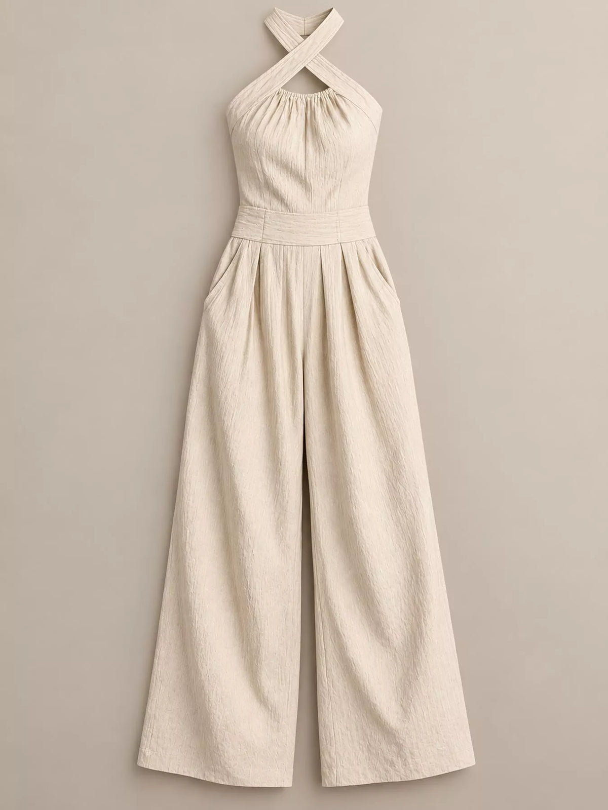 Off-white linen halter wide-leg jumpsuit laid flat, gathered waist and wide trousers