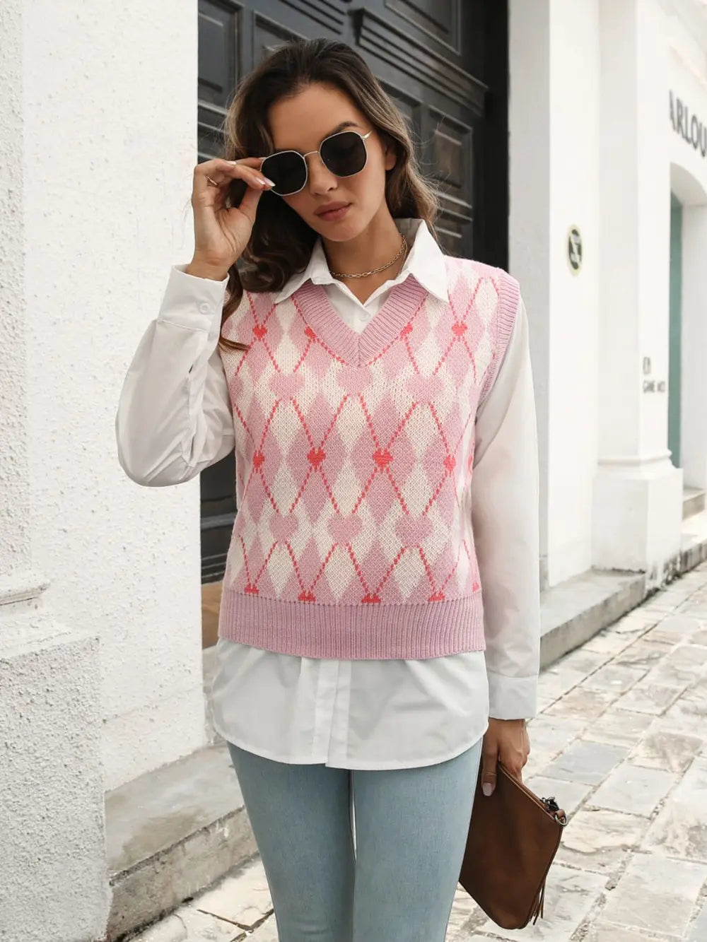 Blush pink geometric V-neck sweater vest with pink diamond argyle knit pattern
