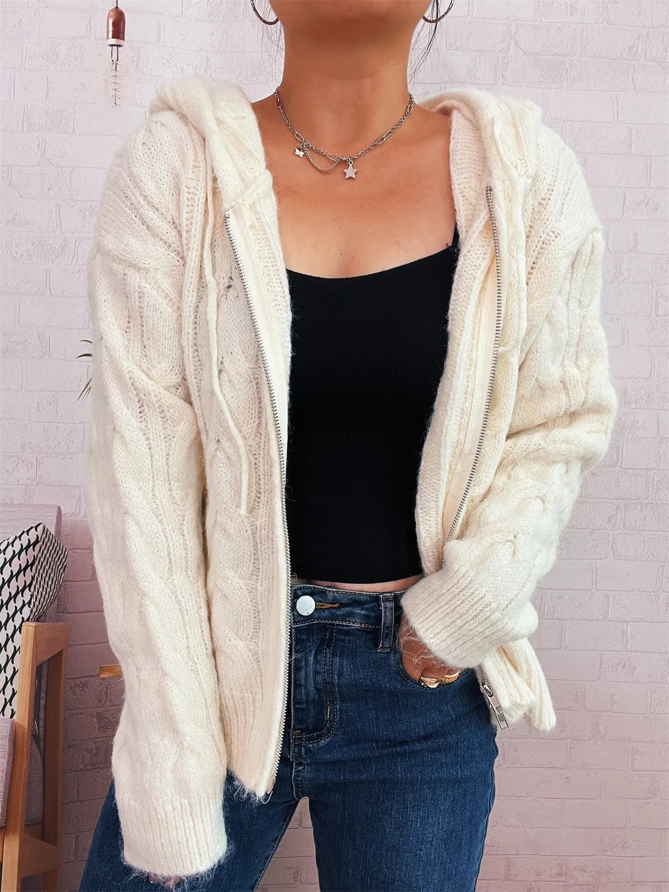 White cable knit hooded zip-up cardigan, open front with side pockets