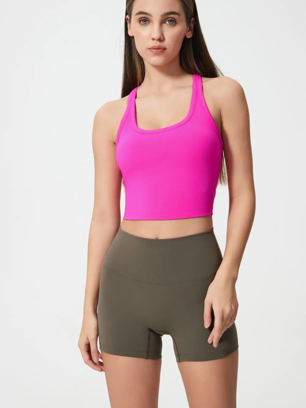 Hot pink scoop neck active tank with racerback, cropped athletic fit.