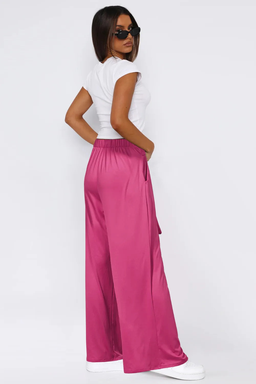 Hot pink wide-leg pants with waist tie and side pockets