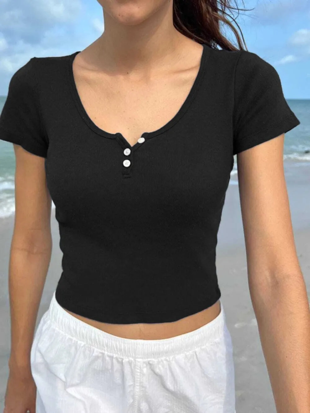Black button-detail short-sleeve T-shirt with scoop neck and snap front buttons