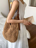 Camel crochet shoulder bag with brown leather straps, draped slouch design