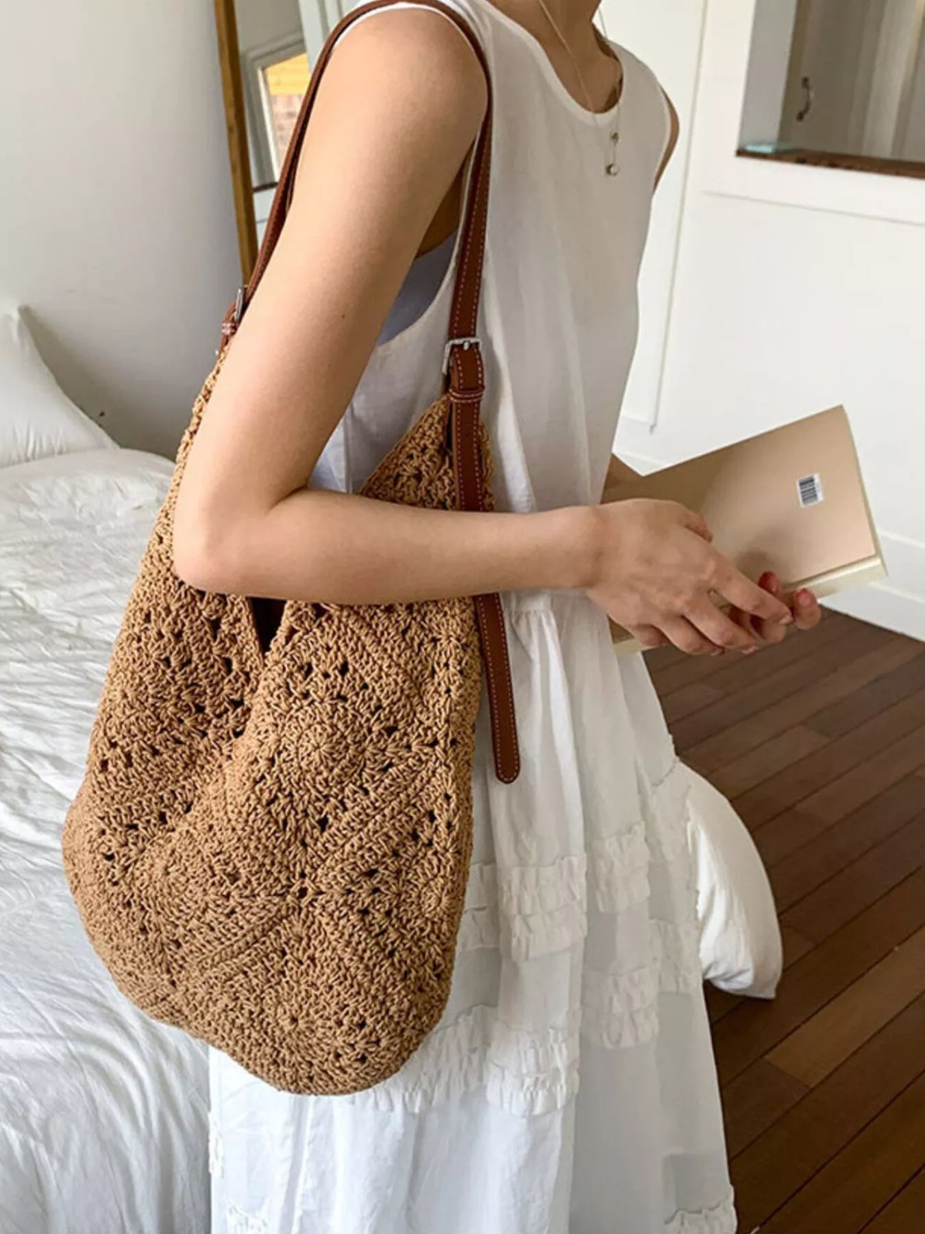 Camel crochet shoulder bag with brown leather straps, draped slouch design