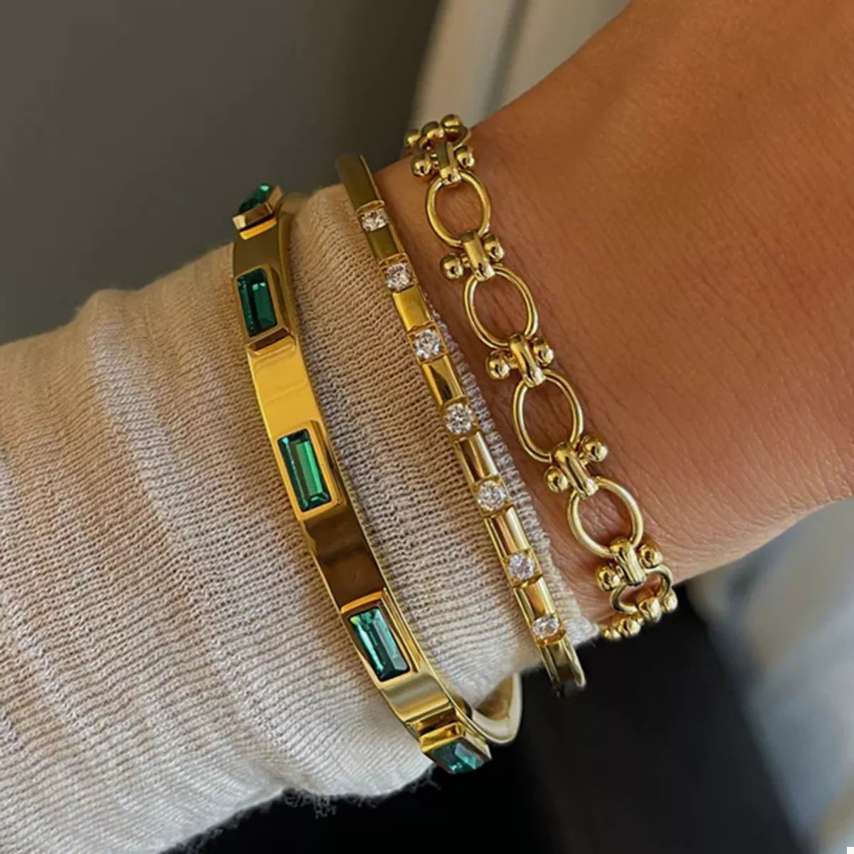 Gold-plated zircon bracelet cuff with green rectangular enamel insets and crystal stations