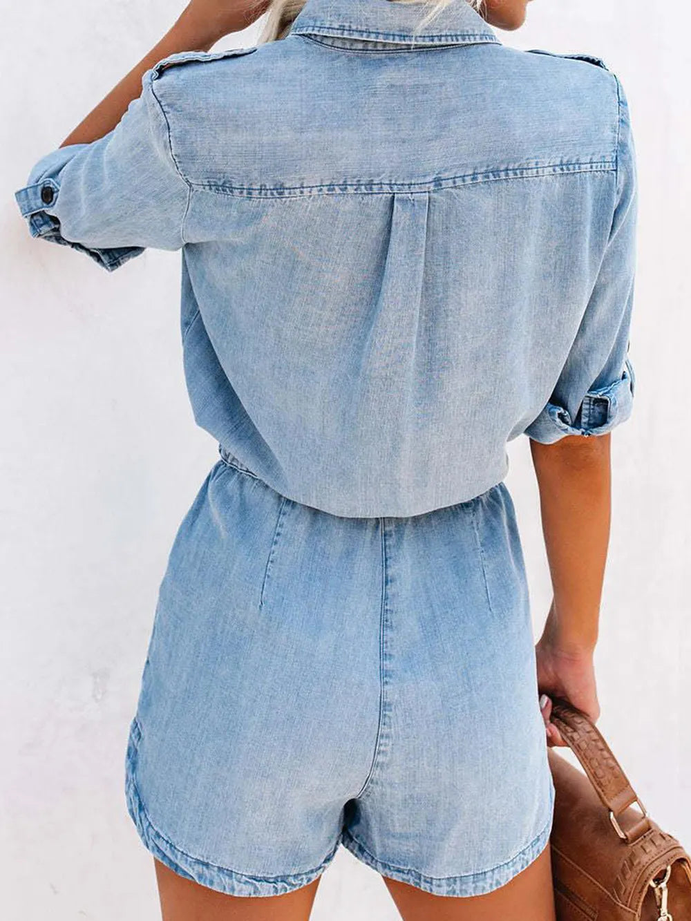 Light blue denim romper, open back, half sleeves, drawstring waist, patch pockets
