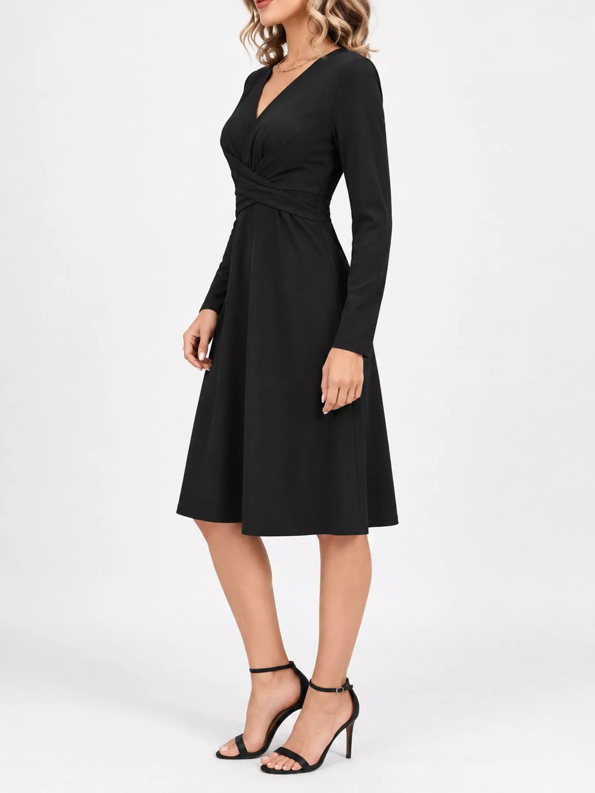 Black long-sleeve V-neck midi dress with ruched waist and crisscross front detail