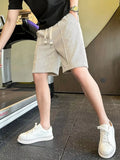 Men's striped drawstring casual shorts, light apricot and white, above-knee