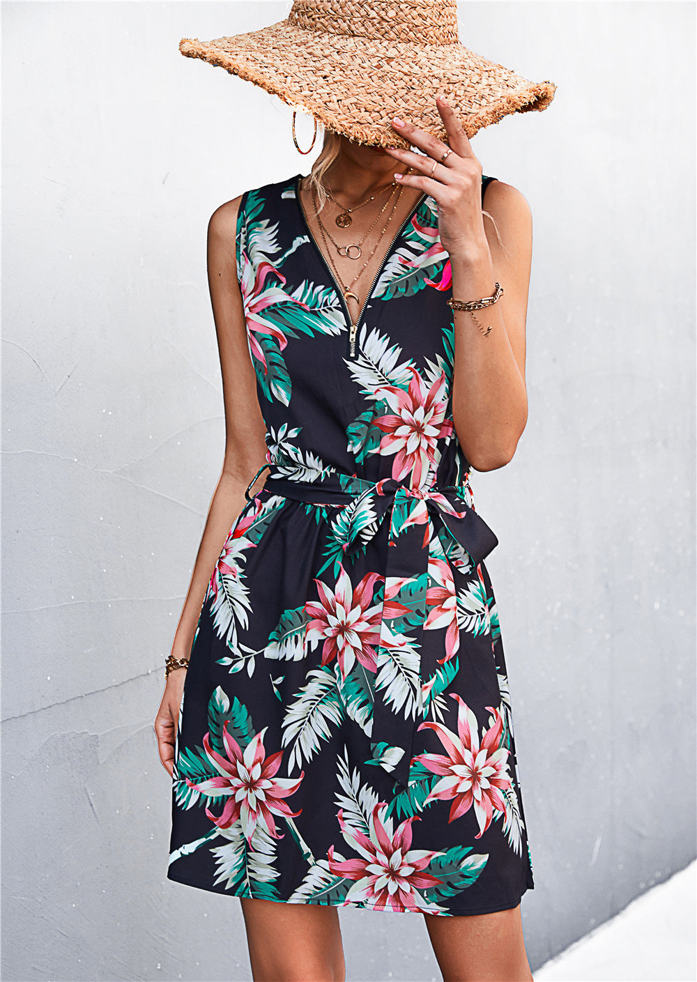 Floral sleeveless belted zip dress, black with pink and green tropical flower print
