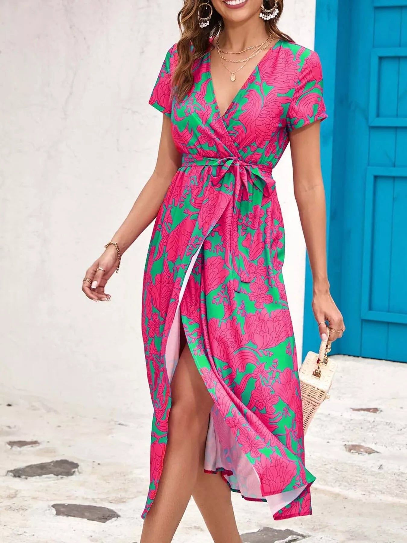 Pink and green floral surplice short-sleeve midi dress with tied waist and side slit