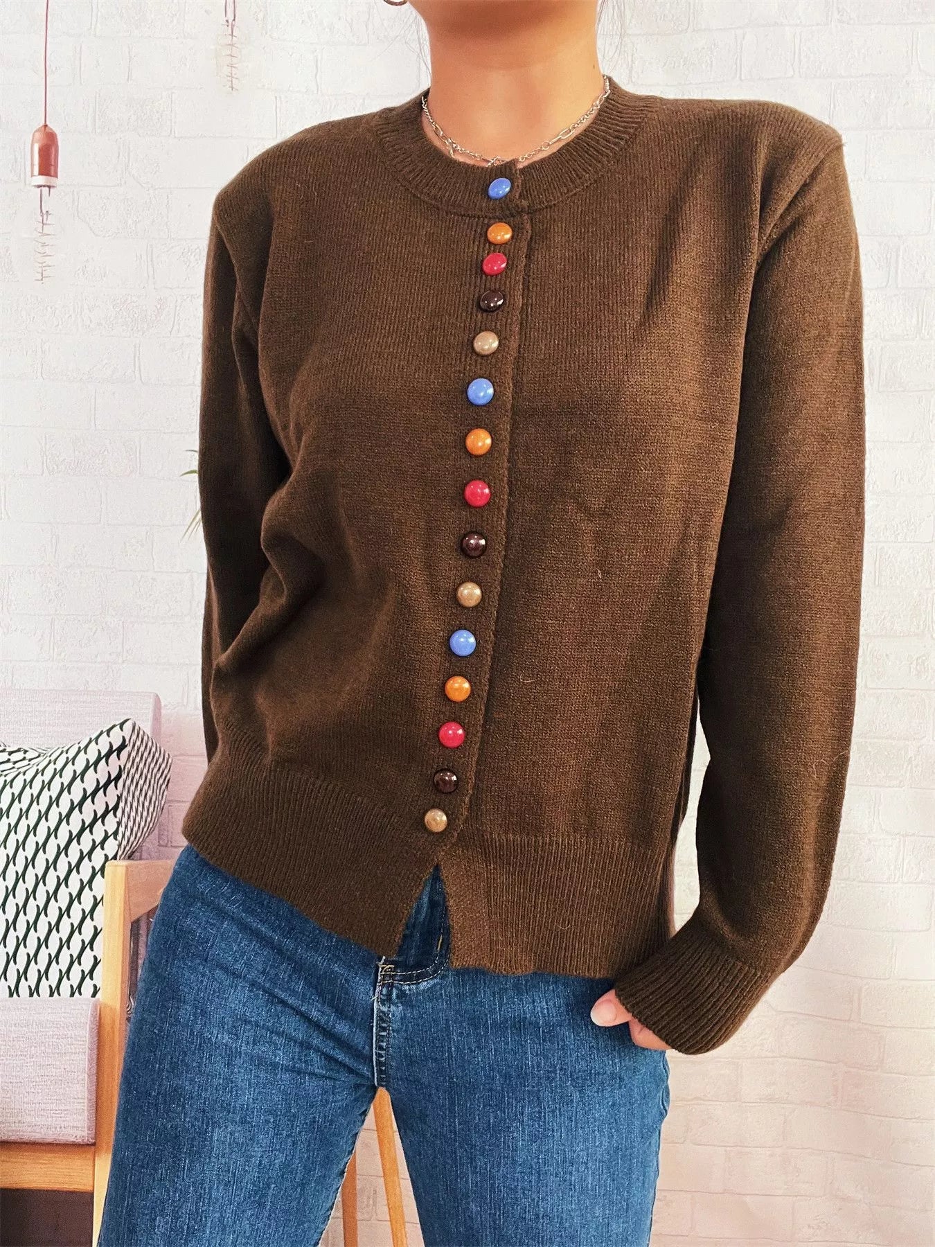 Brown button-front cardigan with colorful detail buttons down center, long sleeves