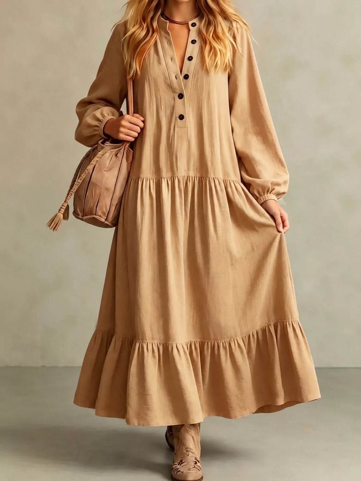 Light tan tiered maxi dress with button-front bodice and gathered long sleeves