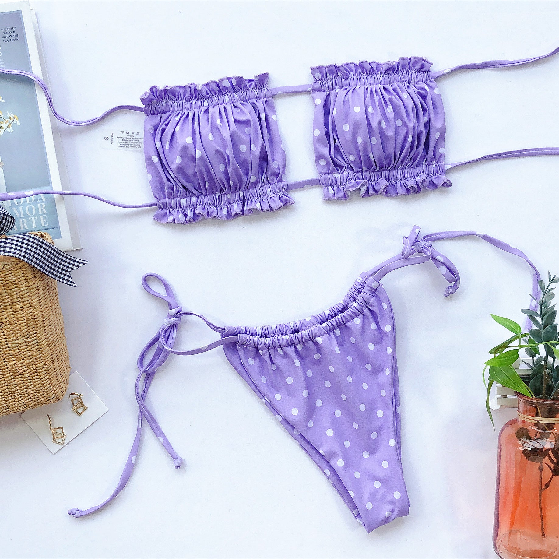 Lavender polka dot ruched bandeau bikini top with matching side-tie bikini bottom