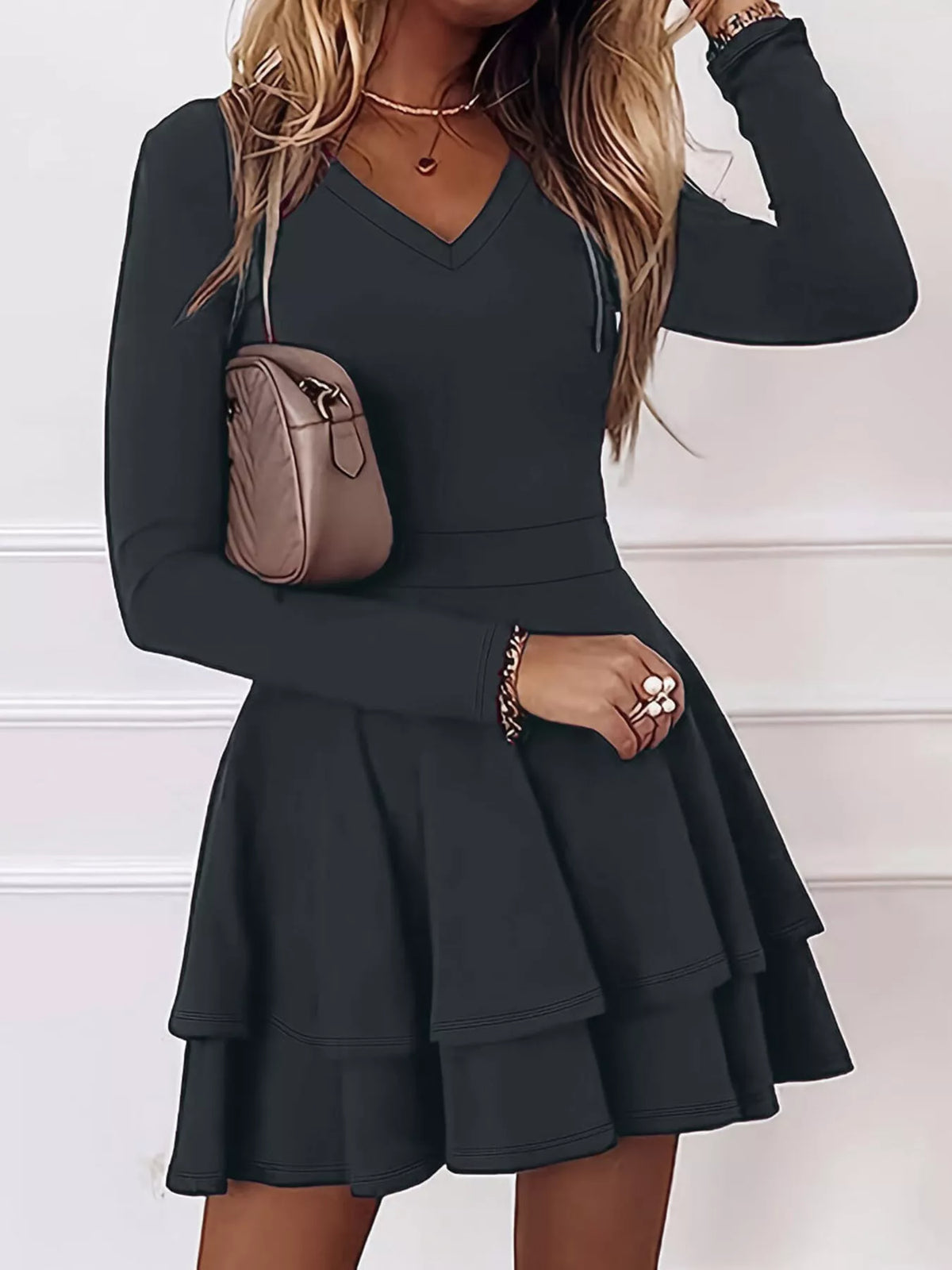 Black V-neck long-sleeve tiered ruffle mini dress with flared layered skirt