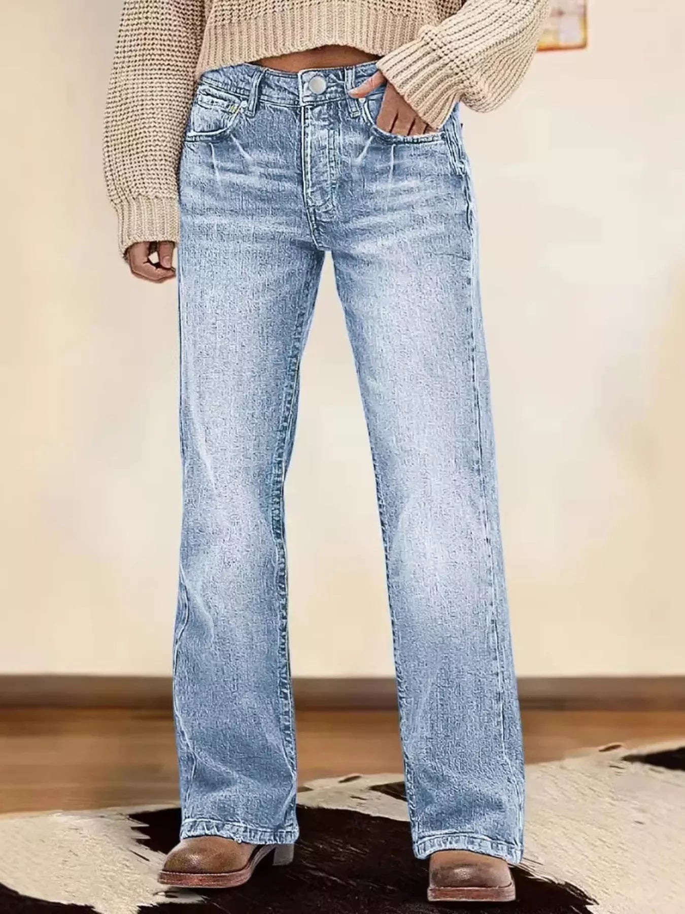 Light blue vintage wash straight-leg jeans, button fly, five-pocket style.