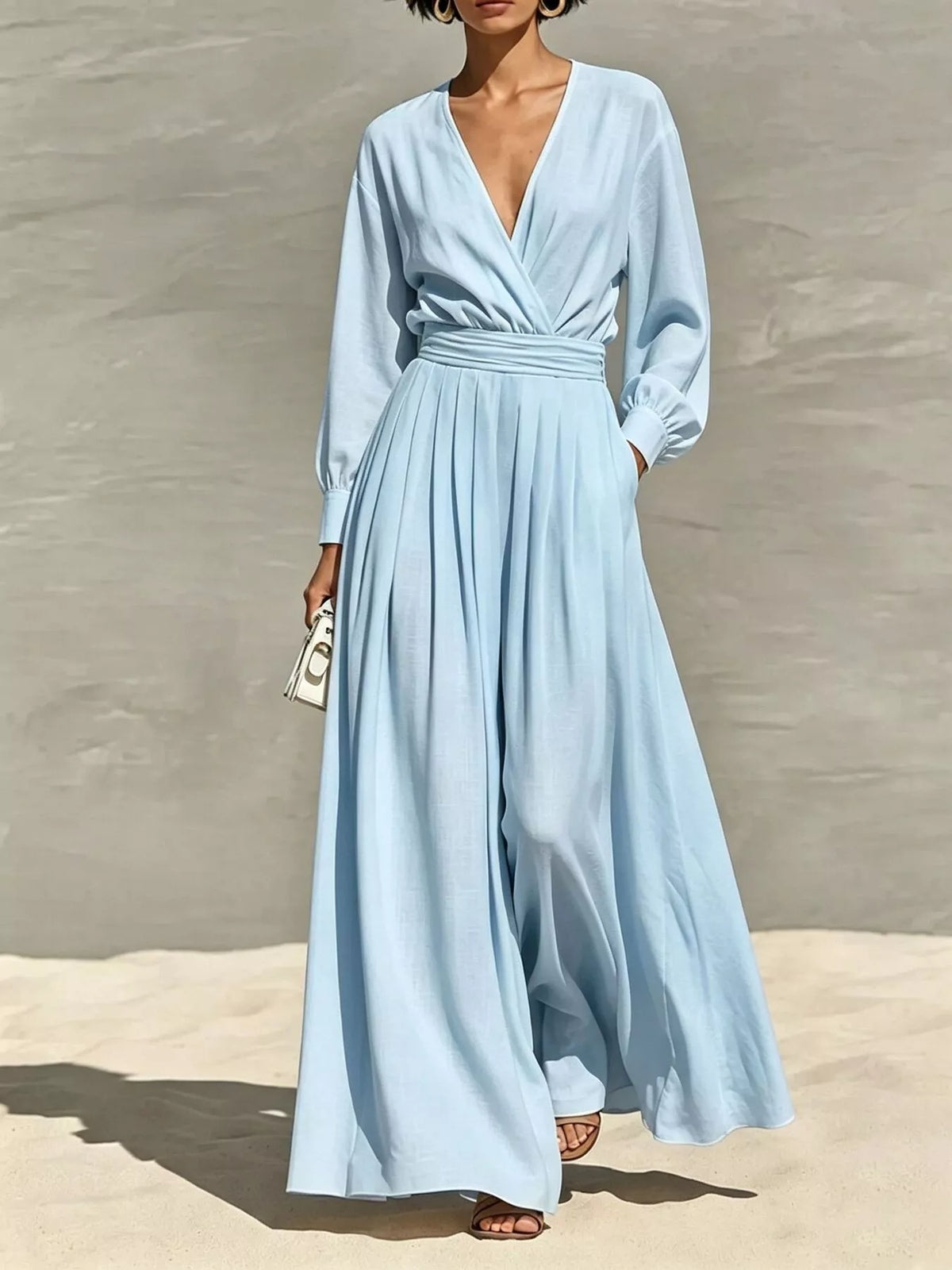 Light blue long-sleeve wide-leg wrap jumpsuit with V-neck and gathered waist