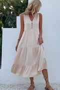 Ivory sleeveless tiered dress with button front and V-neck