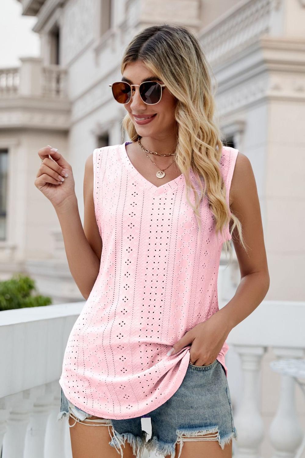 Blush pink eyelet V-neck tank with sleeveless lace cutout pattern and tied hem