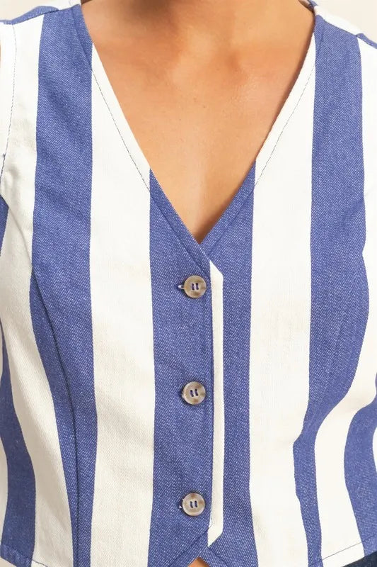 Striped woven V-neck vest close-up with button placket, indigo and cream
