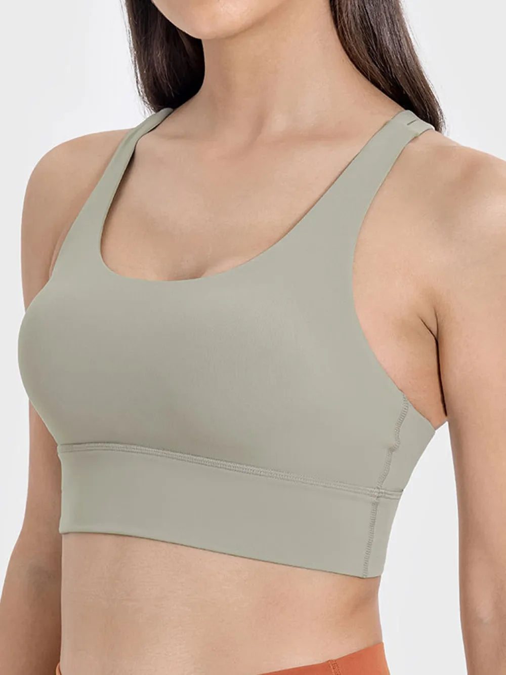 Scoop neck active tank top in sage green with supportive elastic hem