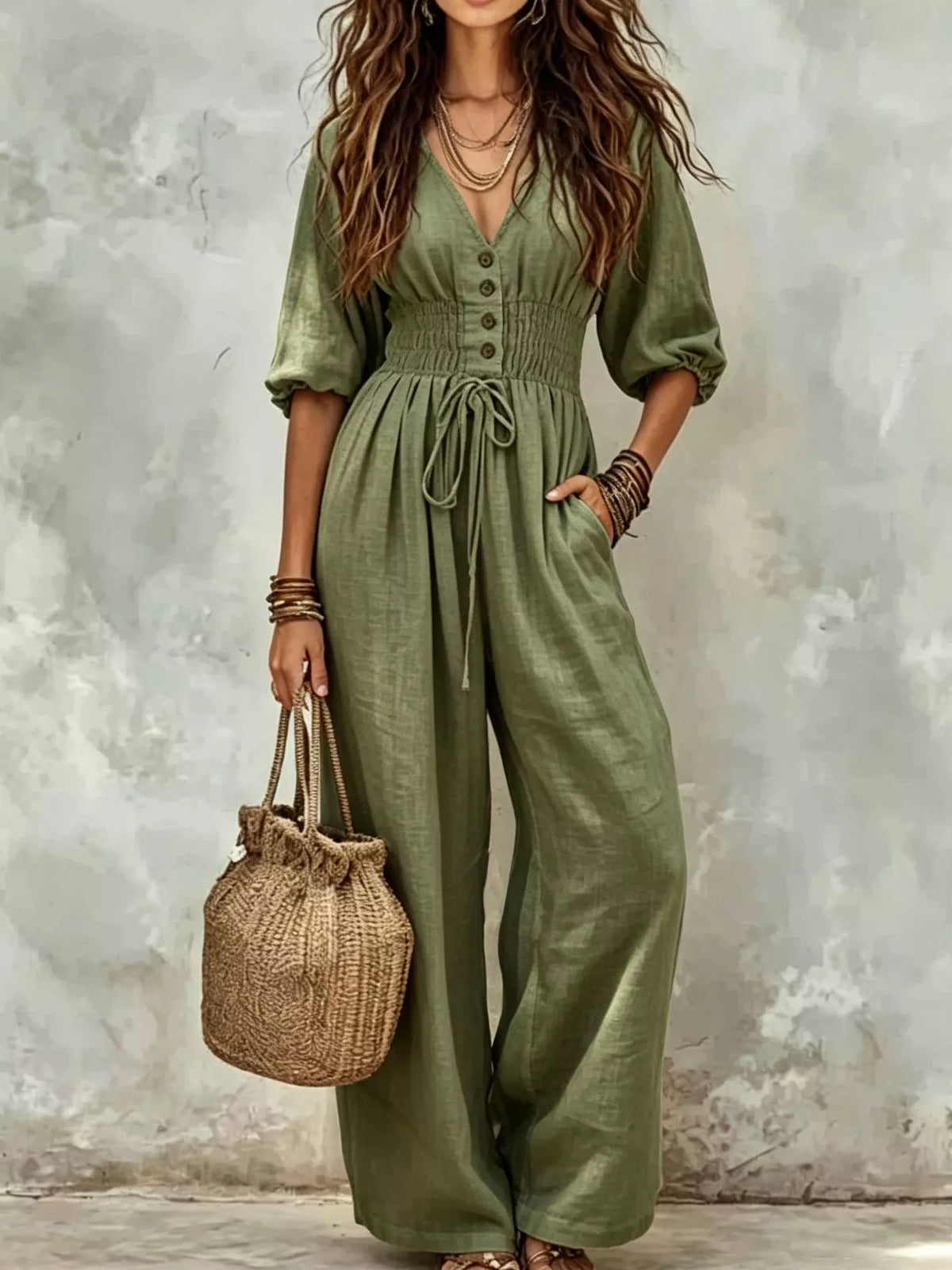 Army green v-neck smocked-waist wide-leg jumpsuit with drawstring waist and pockets