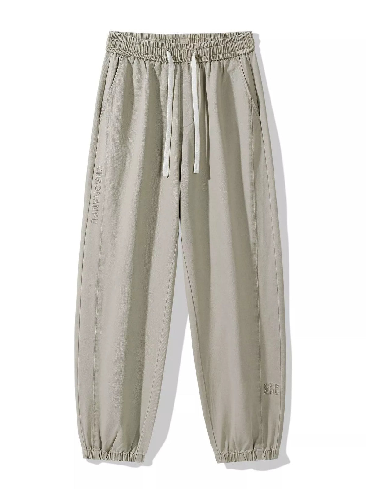 Men's casual light khaki joggers with elastic waistband, drawstring, and side pockets