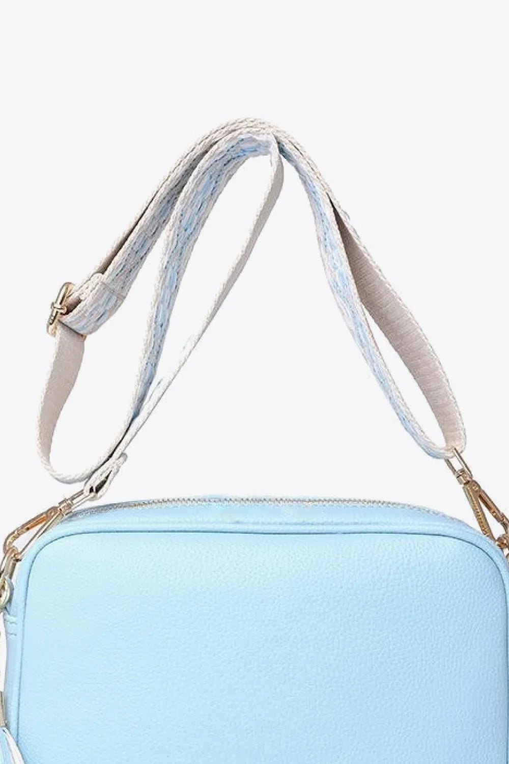 PU leather tassel crossbody bag, light blue with tassel and gold-tone chain strap