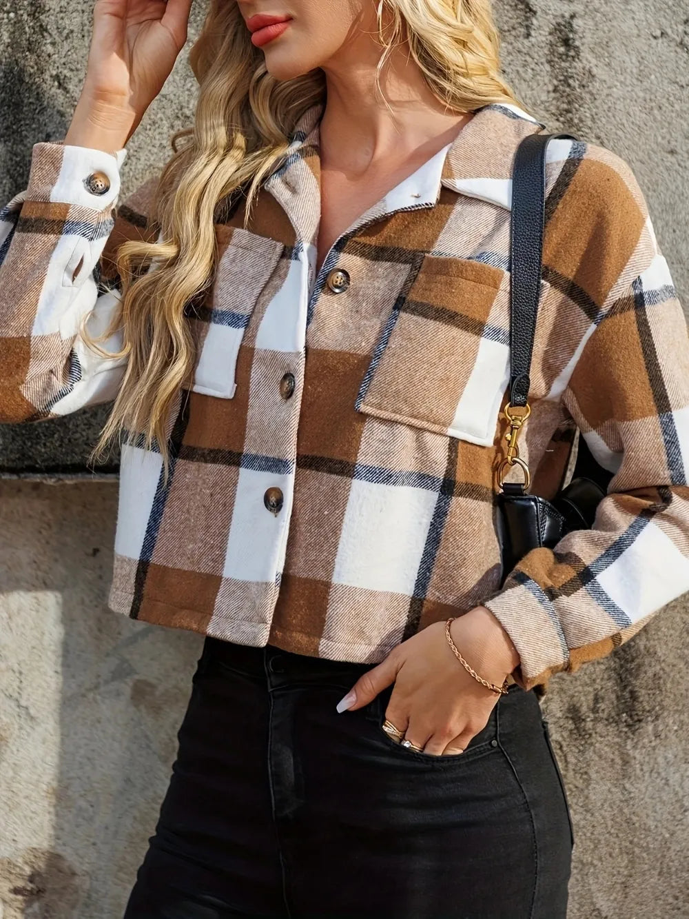 Cropped plaid jacket with button front, chest flap pockets, and long sleeves, caramel and blue