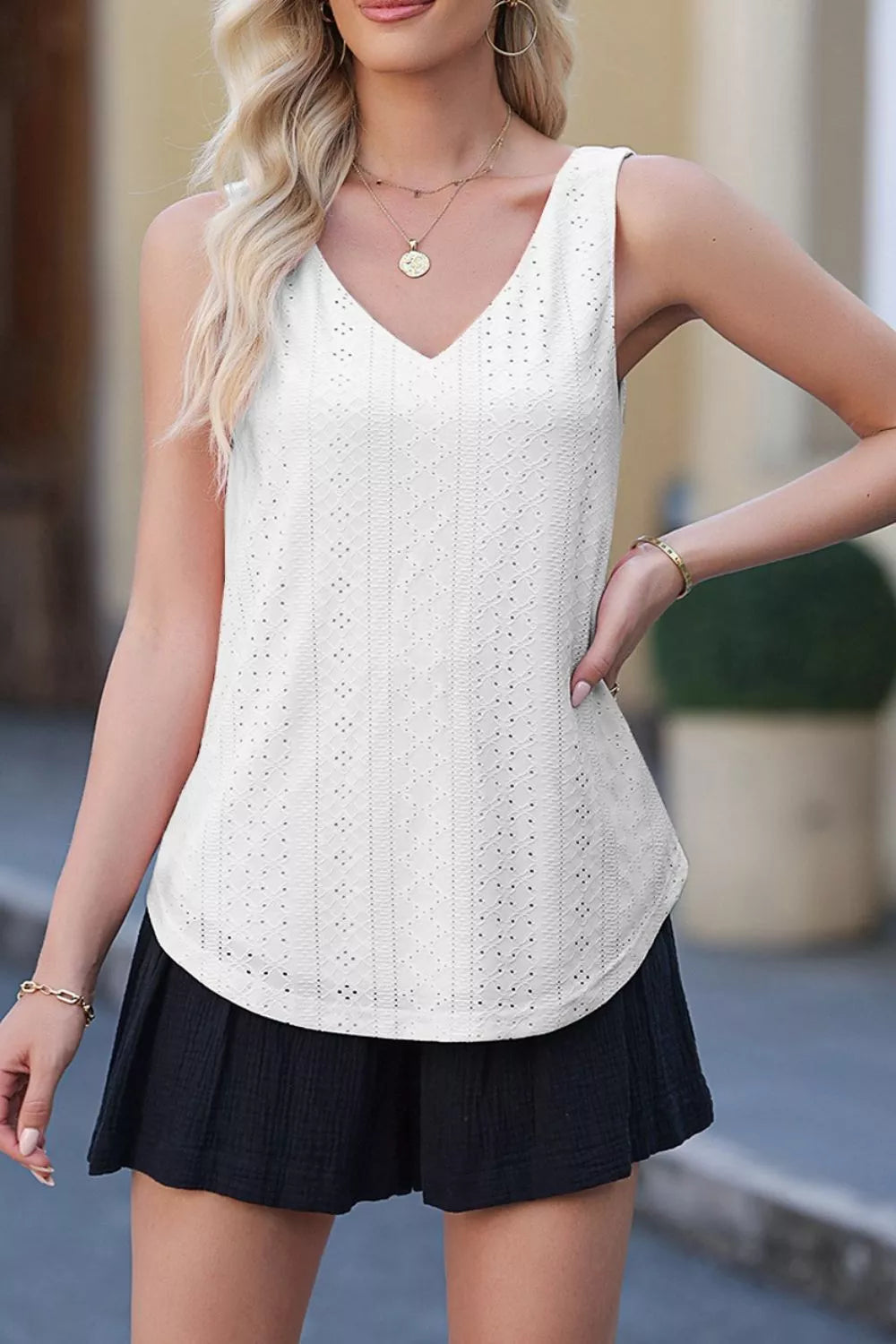 White eyelet knit V-neck loose tank top with sleeveless patterned texture