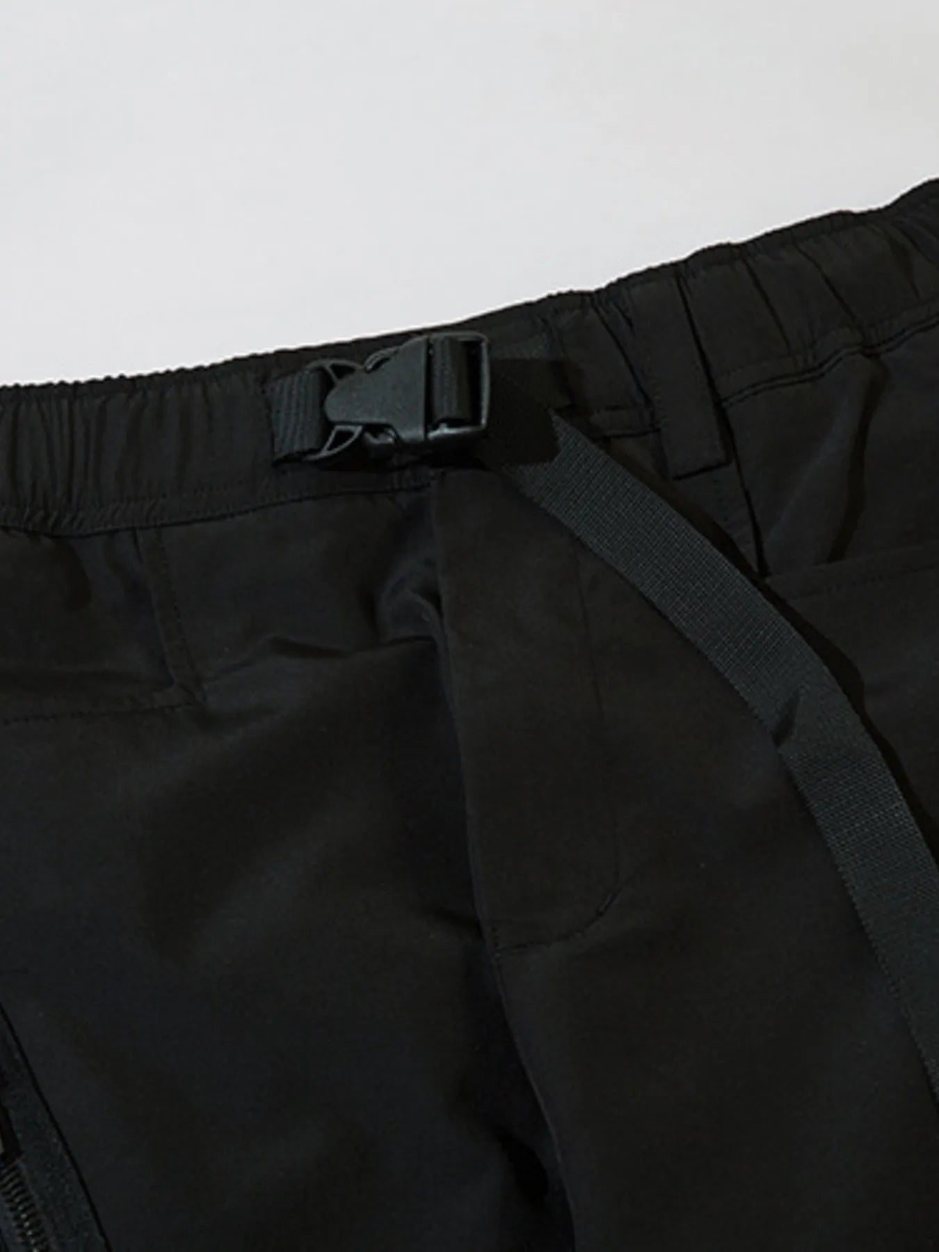 Black cargo joggers waist with adjustable belt loop and elastic waistband