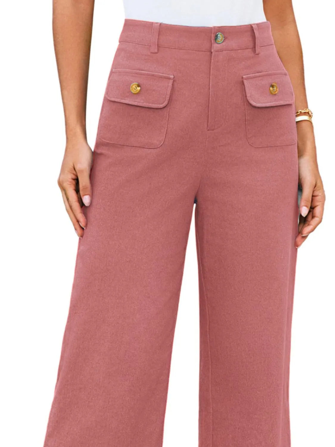 Dusty pink high-waist wide-leg pants with front pockets and button detail