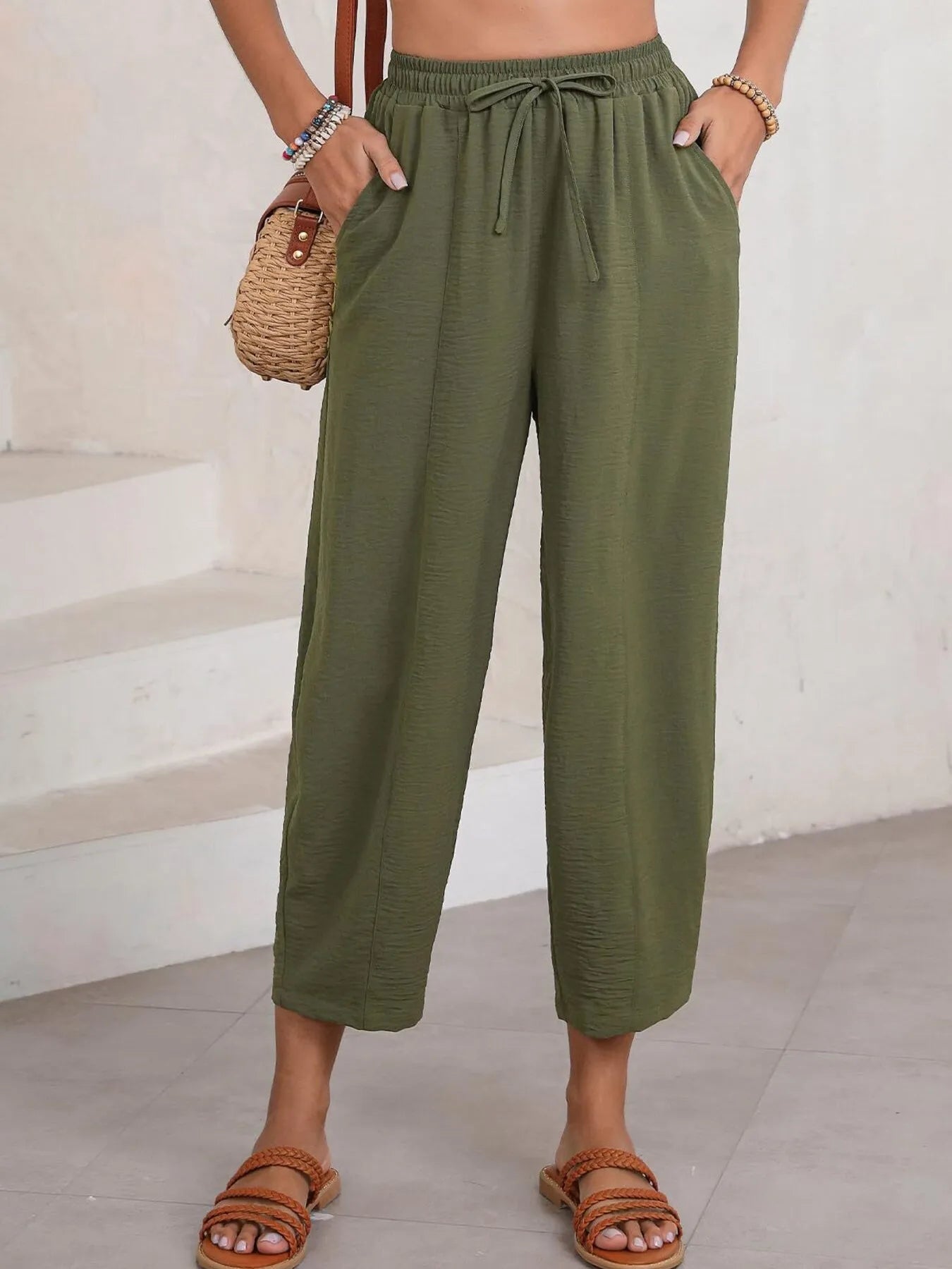 Army green cropped wide-leg pants with drawstring elastic waist, ankle length