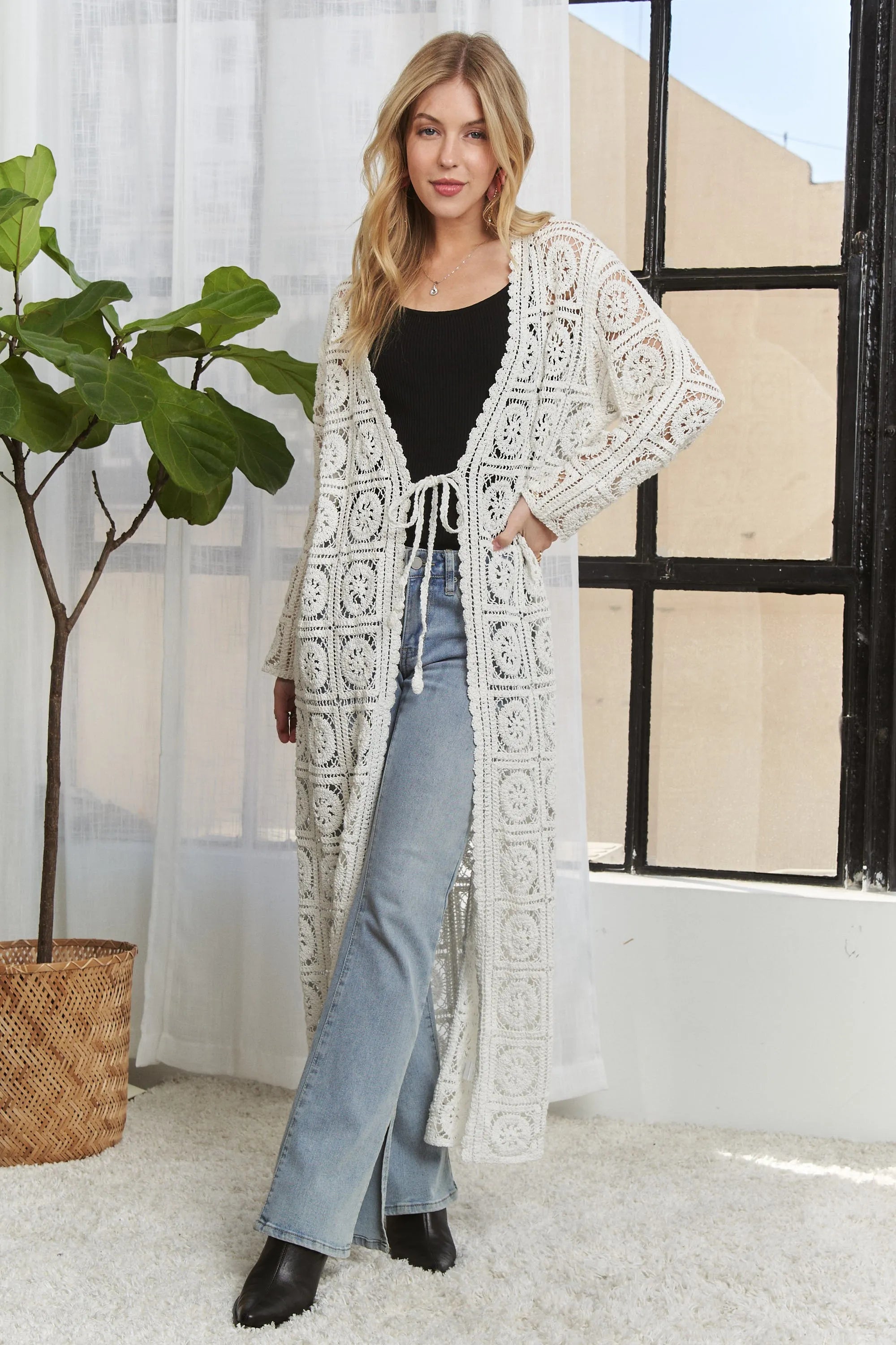 Ivory crochet long cardigan with long sleeves, open front, and textured square motif
