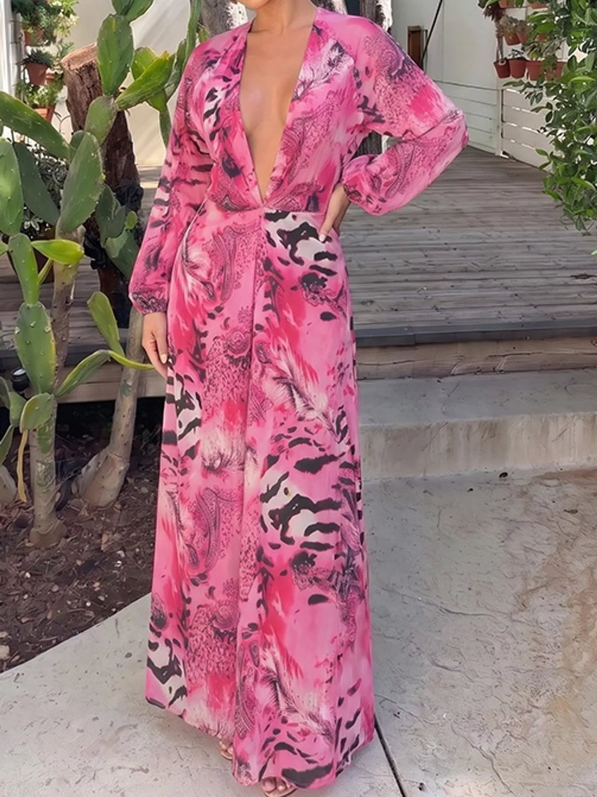 Pink printed long sleeve maxi dress with deep V plunge and open back detail