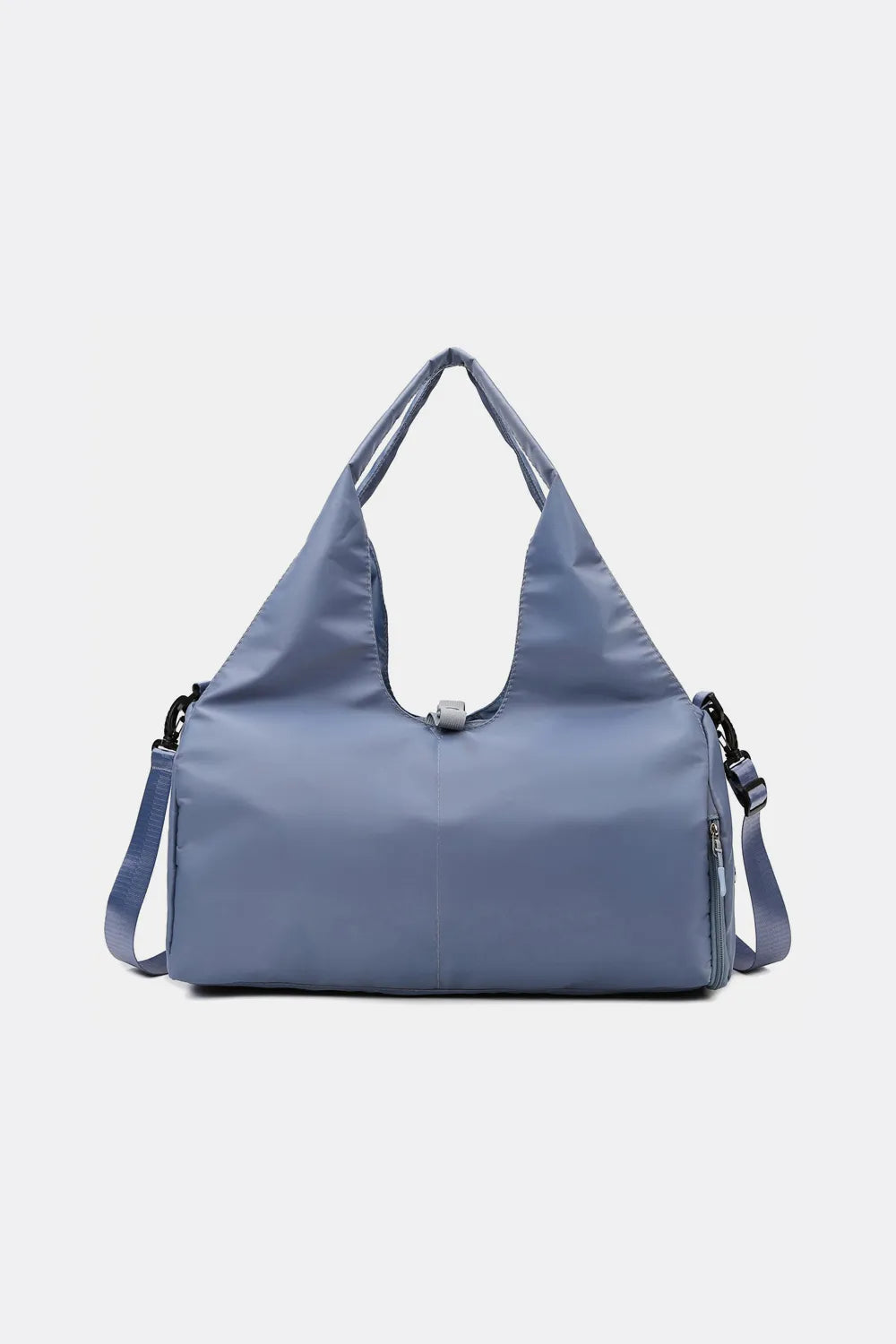 Waterproof travel tote bag in dusty blue with top handle and side zipper pocket.