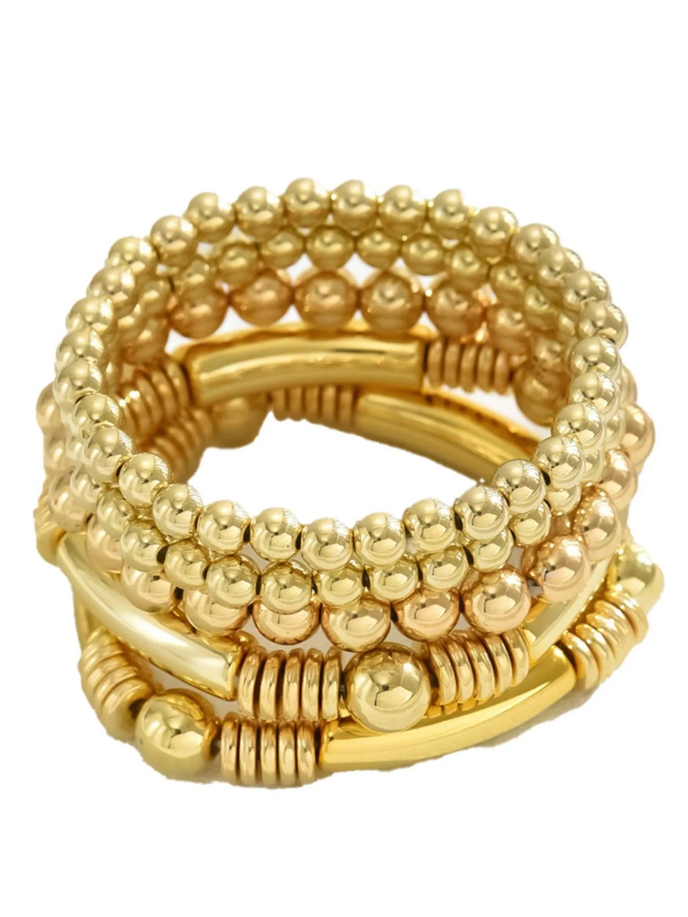 Gold beaded bracelet set with stacked bangles and round charm detail