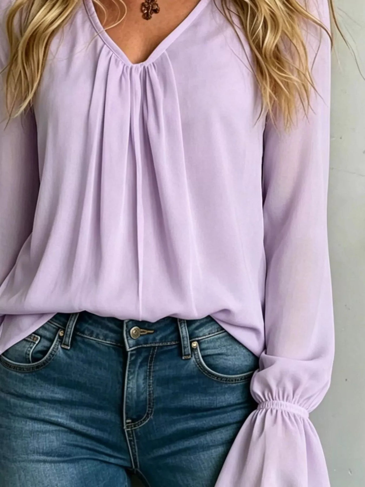 Pink purple v-neck polyester blouse with gathered cuffs and draped pleated front
