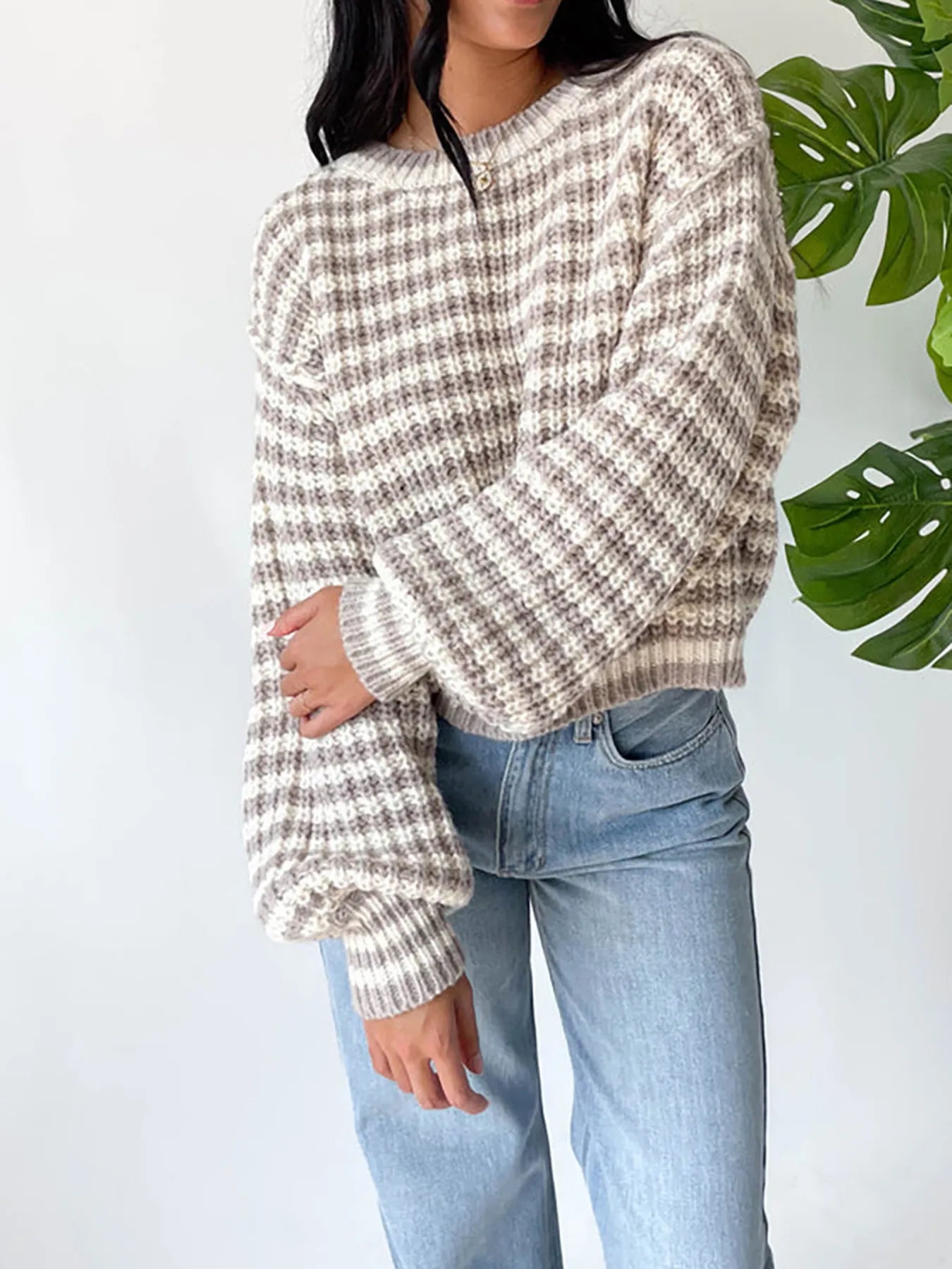 Oversized striped drop-shoulder sweater in light taupe with dark knit check stripes