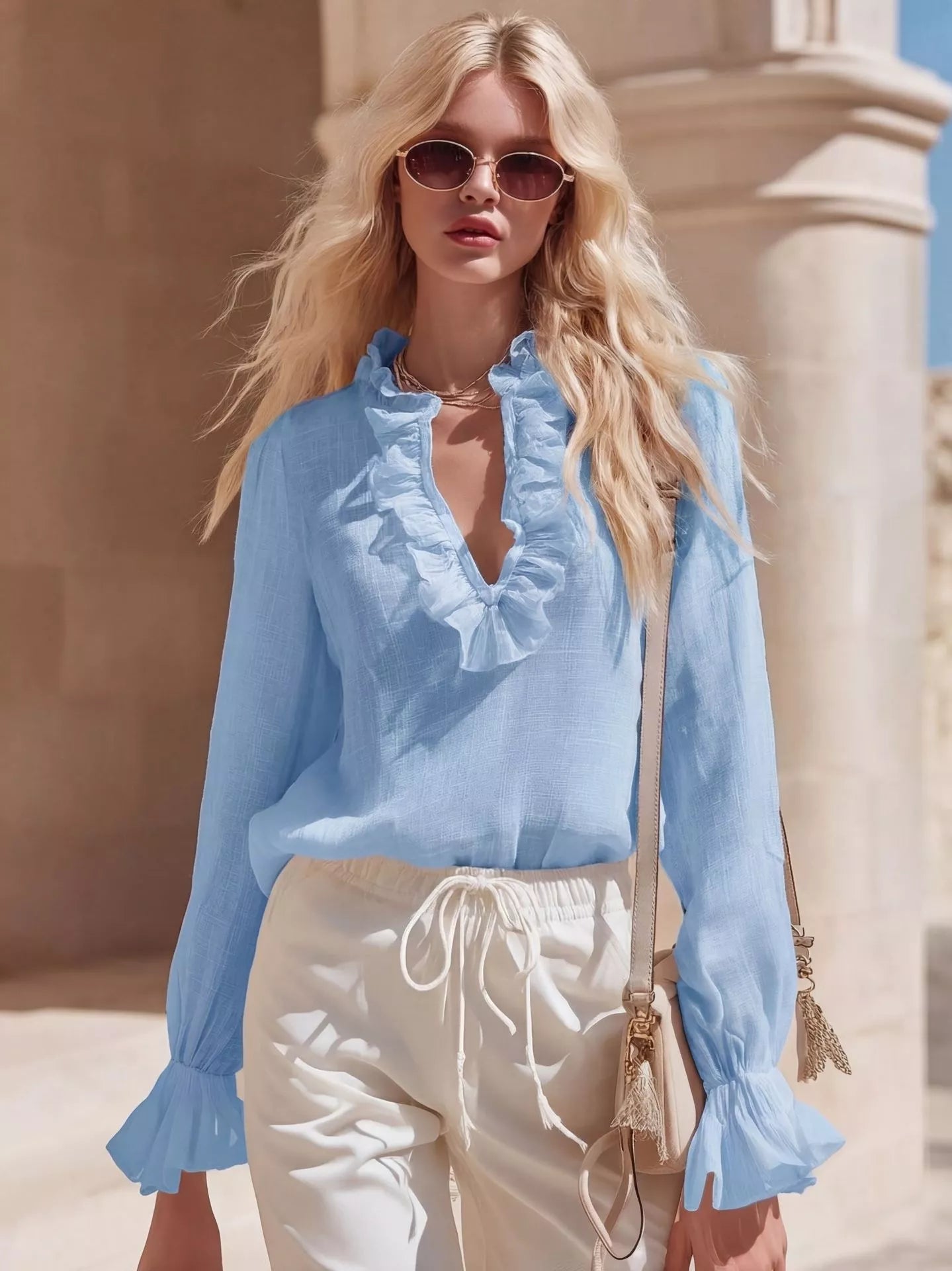 Sky-blue ruffled V-neck long-sleeve blouse with frilled front detail