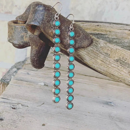 Turquoise alloy bar earrings with oval turquoise stones in two stacked rows
