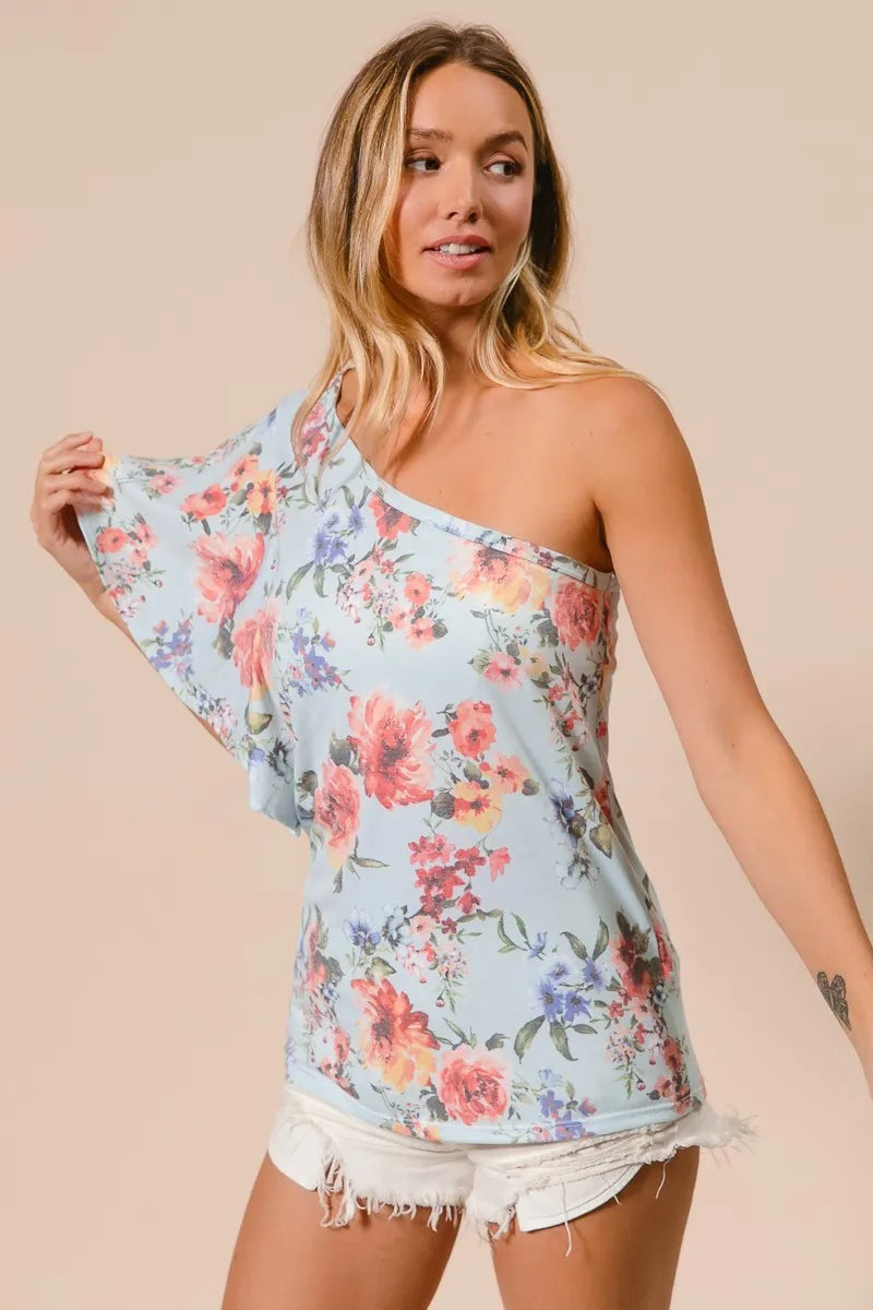 Floral printed jersey top in light blue with one-shoulder ruffle sleeve