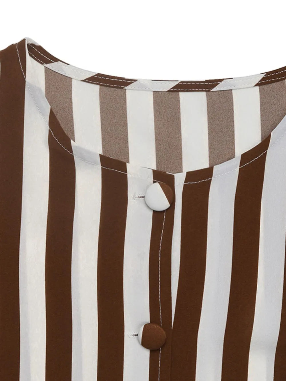 Close-up of brown and white striped blouse round neck with two-tone button details