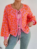 Leopard tie-front cardigan, orange knit with pink lace-up neckline